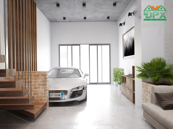 Khu vực đỗ xe rộng rãi cùng sàn nhà được thiết kế giật cấp phân chia phòng khách và gara