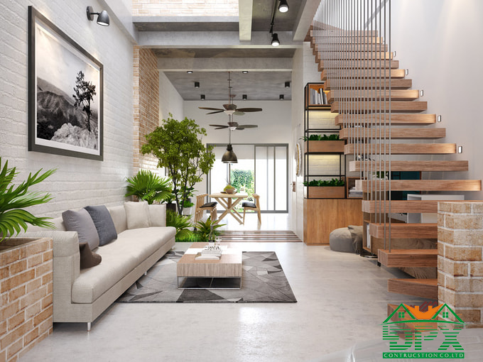 Cầu thang được thiết kế ép sát bên tường giúp không gian phòng khách được mở rộng tối đa