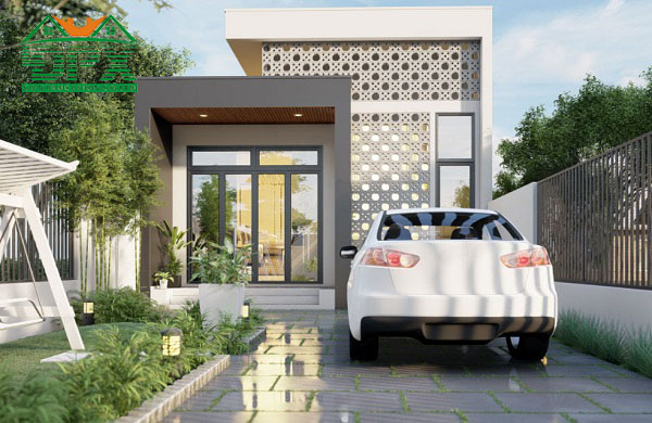 Mẫu nhà nhỏ này được thiết kế đơn giản, tinh tế với gam màu trắng là màu chủ đạo. Điểm nhấn nổi bật cho căn nhà này là những ô gạch bông gió xinh xắn và khoảng sân vườn phía trước giúp tô điểm vẻ đẹp tự nhiên cho căn nhà